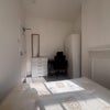 Photo 2: Wardrobe, chest of drawers, and desk in the free room