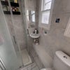Photo 8: The bathroom you would share with 2 others