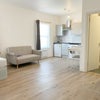 Photo 2: Open plan bedroom/living room/kitchen