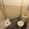 Photo 10: Shared Toilet