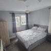 Photo 5: Bedroom with brand new king size bed