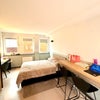 Photo 2: Spacious studio room with double bed and workspace