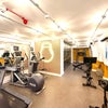 Photo 8: Residents-only gym with cardio and weight equipment 