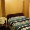 Photo 1: Spacious double bedroom with bed, desk, chair and double wardrobe