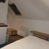 Photo 6: Attic room 