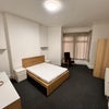 Photo 2: There are blinds behind the curtains which can be closed if you want no light getting through
