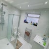 Photo 5: Shower and commode 