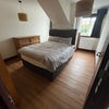 Photo 6: Dbl rm with King size bed. Natural light