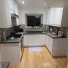 Photo 5: Main kitchen area (there is more in next room)