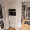 Photo 6: Kitchen area looking towards hallway and front door
