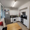 Photo 6: Kitchen with table and access to balcony