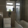Photo 8: Bathroom with tub and shower-over 