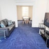 Photo 1: Lounge - 2 leather sofas & 50" HD TV
