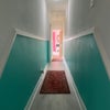Photo 5: Long corridor separating your rooms from the rest of the house