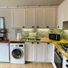 Photo 5: Fully equipped kitchen with gas hob, oven, washing machine and plenty of storage space