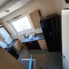 Photo 3: Seperate kitchen with Cooker, Fridge and Washer included