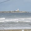 Photo 2: View of coquet island from the back of the house