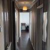 Photo 7: Walkway to rooms and kitchen