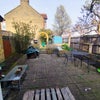 Photo 7: Lovely patio with a back garden