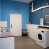 Photo 8: Communal laundry room in adjacent building