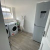 Photo 6: Utility/laundry room
