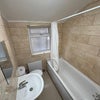 Photo 7: Upstairs Toilet