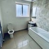 Photo 3: Large bathroom with bathtub