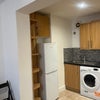 Photo 3: Kitchen with a good-sized fridge and washer/dryer