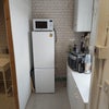 Photo 2: full size fridge and kitchenette