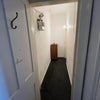 Photo 9: This is the personal corridor to the bedroom. It can be useful for extra storage, like bikes.