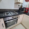Photo 7: Kitchen / Hob / Extractor / Oven / Microwave / Fridge Freezer / Washing machine & dryer