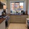 Photo 6: Kitchen with built in fridge, stand alone freezer and microwave, air fryer, coffee machine etc