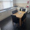 Photo 8: Communal Kitchen - Alpha Drive
