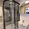 Photo 7: on suite bathroom with shower pod