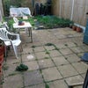 Photo 9: Rear garden with patio and chairs