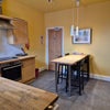 Photo 6: The ground floor shared main kitchen