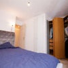 Photo 3: Double bedroom with 6 door wardrobe 