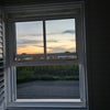 Photo 2: Lodger bedroom's louvered plantation shutter window with sunset views