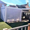 Photo 8: Louvered adjustable rooftop three section L-shaped pergola with paver floor (shared)