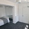 Photo 2: Very spacious double room with floor to ceiling wardrobe, fully furnished room.