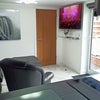 Photo 3: Lounge with 55" tv 