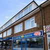 Photo 7: External Picture. Two floors above the shop with rear access