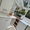 Photo 4: Kitchenette / living area - Bright & green, wonderful views of the garden