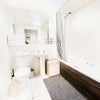 Photo 7: LARGE PRIVATE BATHROOM