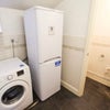 Photo 7: Utility and separate toilet
