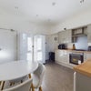 Photo 4: Dining and Kitchen