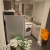 Photo 2: A full size ,fridge , oven , washing machine/dryer
