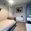 Photo 8: Room 19 at rear of property.         £105 p/w