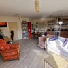 Photo 9: Very large and airy living room-kitchen-diner, with balcony overlooking park