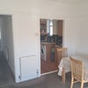 Photo 8: Dining/ living area